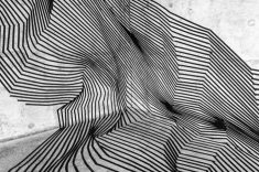 Darel Carey, um artista de tape art que usa ilusão de ótica.